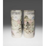 A PAIR OF CHINESE CYLINDRICAL LANDSCAPE VASES REPUBLIC PERIOD Decorated with figures beneath