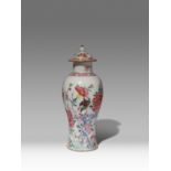 A CHINESE FAMILLE ROSE 'COCKEREL' VASE AND COVER 18TH CENTURY The baluster body painted with two
