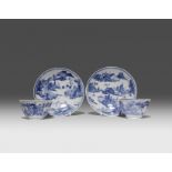 A PAIR OF CHINESE BLUE AND WHITE FLARED 'LANDSCAPE' BOWLS AND SAUCERS KANGXI 1662-1722 Painted