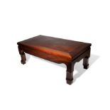 A CHINESE HARDWOOD LOW KANG TABLE LATE QING DYNASTY Of rectangular form, with a curvilinear apron,