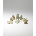 EIGHT SMALL CHINESE ARCHAISTIC CELADON AND YELLOW JADE 'ANIMAL' PENDANTS PROBABLY QING DYNASTY