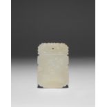 A CHINESE PALE CELADON JADE RECTANGULAR PENDANT QING DYNASTY One side carved with a basket