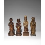 THREE CHINESE GILT-LACQUERED BRONZE FIGURES AND A GILT-WOOD FIGURE MING DYNASTY AND LATER Each