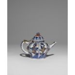 A CHINESE IMARI OCTAGONAL TEAPOT AND COVER KANGXI 1662-1722 Decorated with panels containing leafy