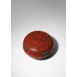 A CHINESE THREE-COLOUR CINNABAR LACQUER CIRCULAR BOX AND COVER 19TH CENTURY Carved with a bowl