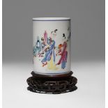 A CHINESE FAMILLE ROSE FIGURAL BRUSHPOT, BITONG PROBABLY LATE QING DYNASTY The cylindrical body