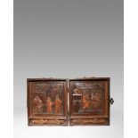A CHINESE WOOD TWO-PANELLED FOLDING SCHOLAR'S BOX 19TH/20TH CENTURY The interior carved with