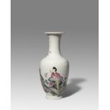 A CHINESE FAMILLE ROSE 'LADY AND PHOENIX' VASE 19TH CENTURY The ovoid body painted with a beauty