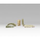 FIVE SMALL CHINESE ARCHAISTIC CELADON JADE CARVINGS PROBABLY QING DYNASTY Comprising: a xi