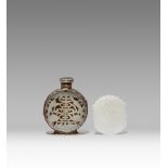 A CHINESE WHITE JADE PLAQUE AND A SNUFF BOTTLE MOUNTED WITH JADE PLAQUES QING DYNASTY AND LATER
