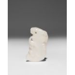 A CHINESE WHITE JADE PENDANT QING DYNASTY Crisply carved as a large gnarled flowering prunus