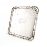 A presentation silver salver H. Atkin, Sheffield 1929 Square form, moulded border, the centre