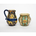 A Della Robbia Pottery jug by John Fogo, painted with bands of heart-shaped geometric decorated