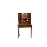 A Scottish oak bureau the design attributed to E A Taylor, rectangular top with fold out writing