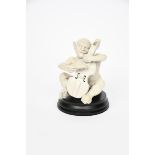 A Martin Brothers stoneware Imp Musician by Robert Wallace Martin, modelled seated playing the