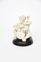 A Martin Brothers stoneware Imp Musician by Robert Wallace Martin, modelled seated playing the