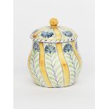 A Wedgwood pot and cover by Grace Barnsley, swollen ovoid form painted with columns of blue