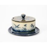 A rare Martin Brothers stoneware butter dish and cover by Robert Wallace Martin, dated 1882, the