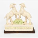 Daisy Borne (1906-1988) Two Kids Playing (goats) pottery sculpture glazed in colours, on wooden base