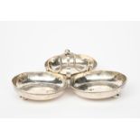 A Liberty & Co silver trefoil serving dish, three circular hammered bowls on ball feet, with central