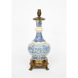 A Theodore Deck Islamic bottle vase, ovoid with tapering, knopped neck, decorated with a band of
