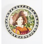 A large John Mortlock & Co London wall charger, on Minton blank, painted with a medieval figure in