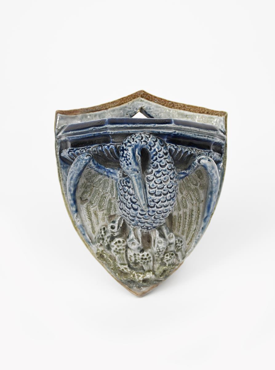 An early Martin Brothers Pottery stoneware wall vesta by Robert Wallace Martin, dated 1877, modelled