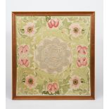 A silk embroidered panel in the manner of Morris & Co, rectangular, embroidered with a border of