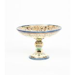 A rare Mintons Henri Deux earthenware tazza designed by Charles Toft, the domed base with rope
