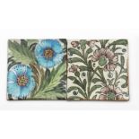 A William De Morgan Sands End tile, painted with two flowers in blue and green on a white ground,