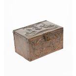 A large John Pearson repousse copper casket, dated 1906, rectangular with hinged cover, hammered