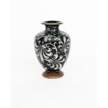 A Martin Brothers stoneware vase by Edwin and Walter Martin, dated 1896, footed baluster form,