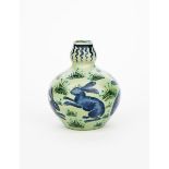 A William De Morgan Pottery vase by Edward Porter, ovoid with knopped neck, painted with hares