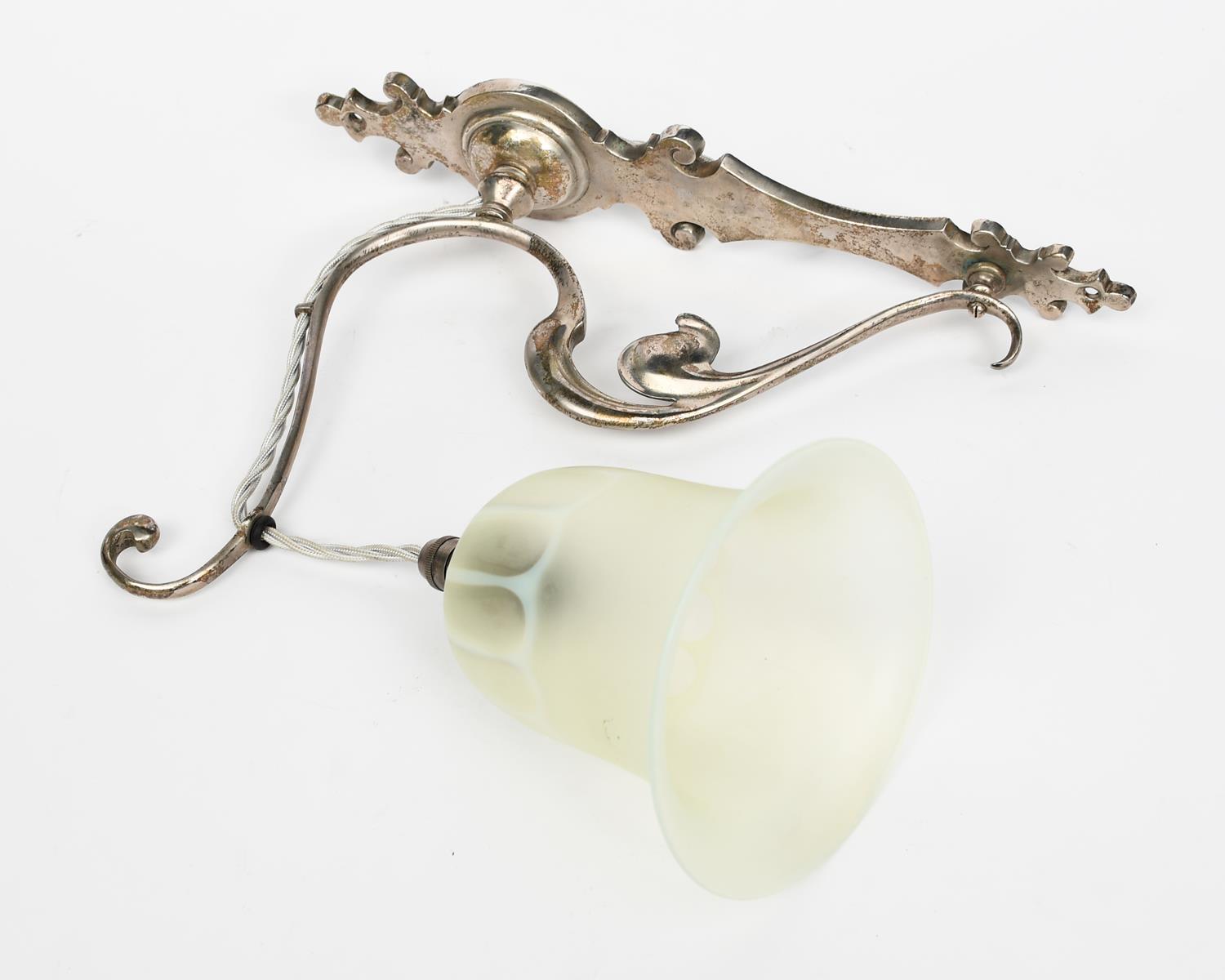 A pair of Art Nouveau wall lights, silvered metal, scrolling foliate form with James Powell satin - Image 2 of 2