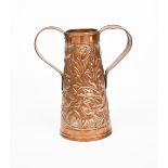 A repousse copper twin-handled vase, tapering cylindrical form, hammered in low relief with entwined