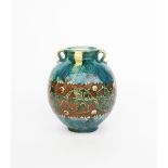 A Della Robbia Pottery vase probably by Elizabeth Beckett, ovoid footed form with applied loop