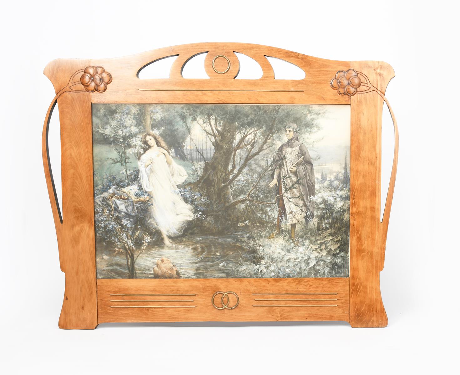 A Continental Secessionist picture frame, pierced and carved with stylised berried stems, inset with