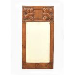 A tooled leather wall mirror by Beatrice Goodwin and Madge Weeks, the rectangular frame with