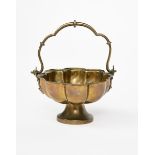 A patinated brass asperges bucket designed by Augustus Welby Northmore Pugin, probably