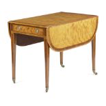 A GEORGE III SATINWOOD PEMBROKE TABLE C.1790 inlaid with stringing and amaranth banding, the drop-