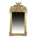 A FRENCH GILT AND SILVERED WOOD WALL MIRROR IN EMPIRE STYLE 19TH CENTURY the later rectangular plate