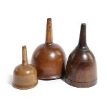 THREE TREEN FUNNELS 19TH CENTURY in beech and boxwood, the largest with a faceted spout (3) 16 x