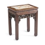 A CHINESE HARDWOOD LOW STAND LATE 19TH CENTURY the top inset with a marble panel, the pierced and