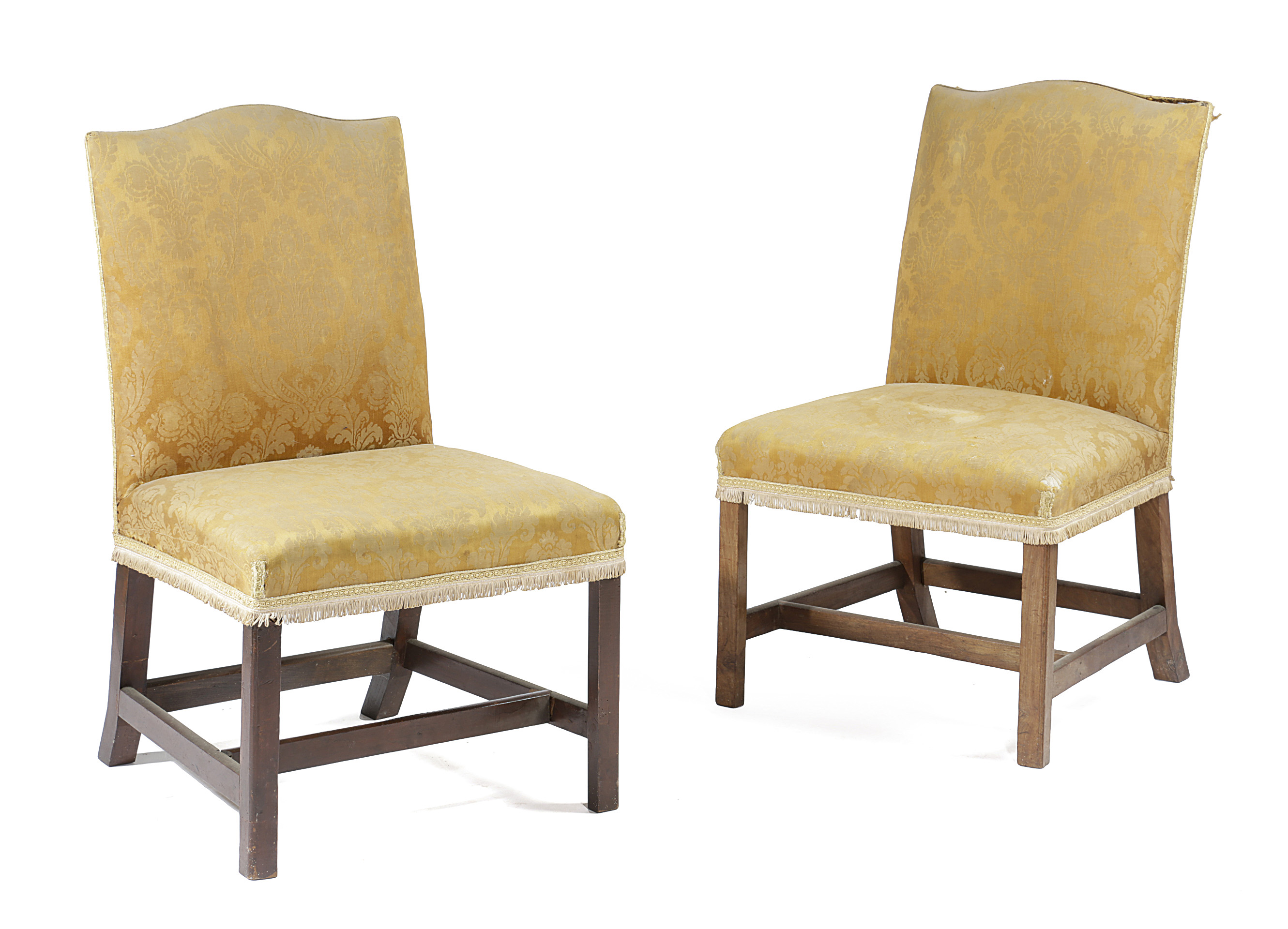 A PAIR OF EARLY GEORGE III MAHOGANY SIDE CHAIRS C.1760 each with an arched back and covered with