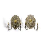 A SET OF FOUR SILVERED BRASS TWIN-LIGHT WALL LIGHTS IN CHARLES II STYLE EARLY 20TH CENTURY each