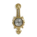 A VICTORIAN GILTWOOD BAROMETER MID-19TH CENTURY with a twelve inch silvered dial and subsidiary