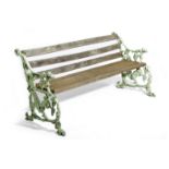 A VICTORIAN CAST IRON AND WOOD GARDEN BENCH IN THE MANNER OF COALBROOKDALE, THIRD QUARTER 19TH
