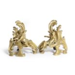A PAIR OF FRENCH ORMOLU CHENETS IN LOUIS XV STYLE LATE 19TH CENTURY modelled as a man with a