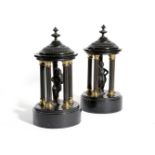 A PAIR OF BLACK MARBLE GRAND TOUR ROTUNDAS MID-19TH CENTURY each with a soldier standing inside five