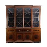 AN EDWARDIAN MAHOGANY BREAKFRONT SECRETAIRE LIBRARY BOOKCASE BY EDWARDS & ROBERTS, EARLY 20TH